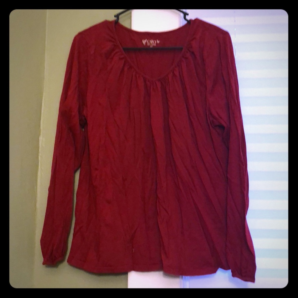 Red long sleeved top
